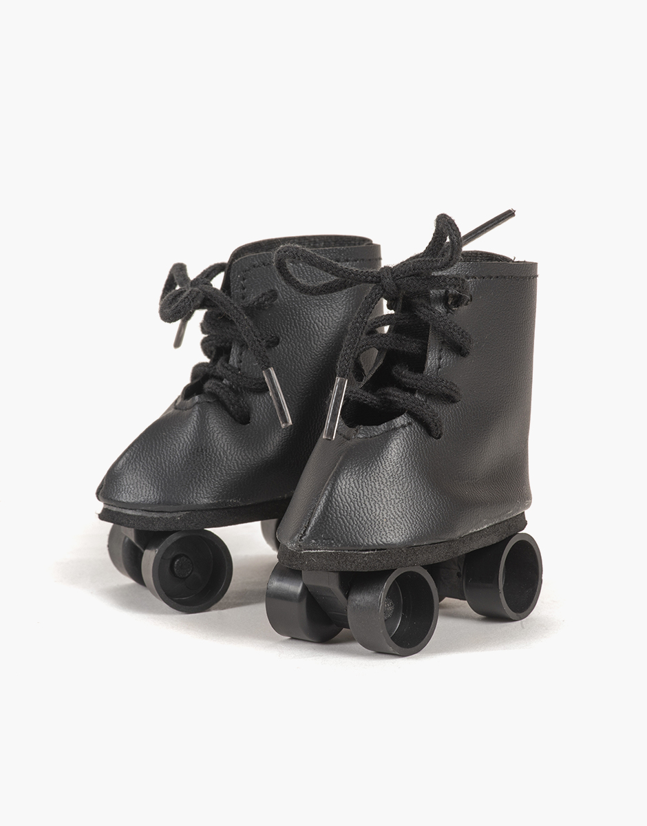 Paire de patins à roulettes en simili cuir noir