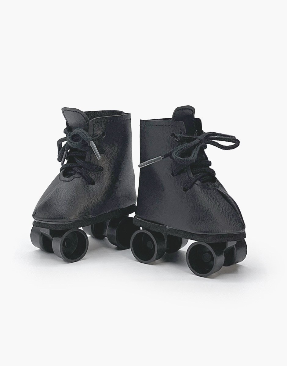 Paire de patins à roulettes en simili cuir noir