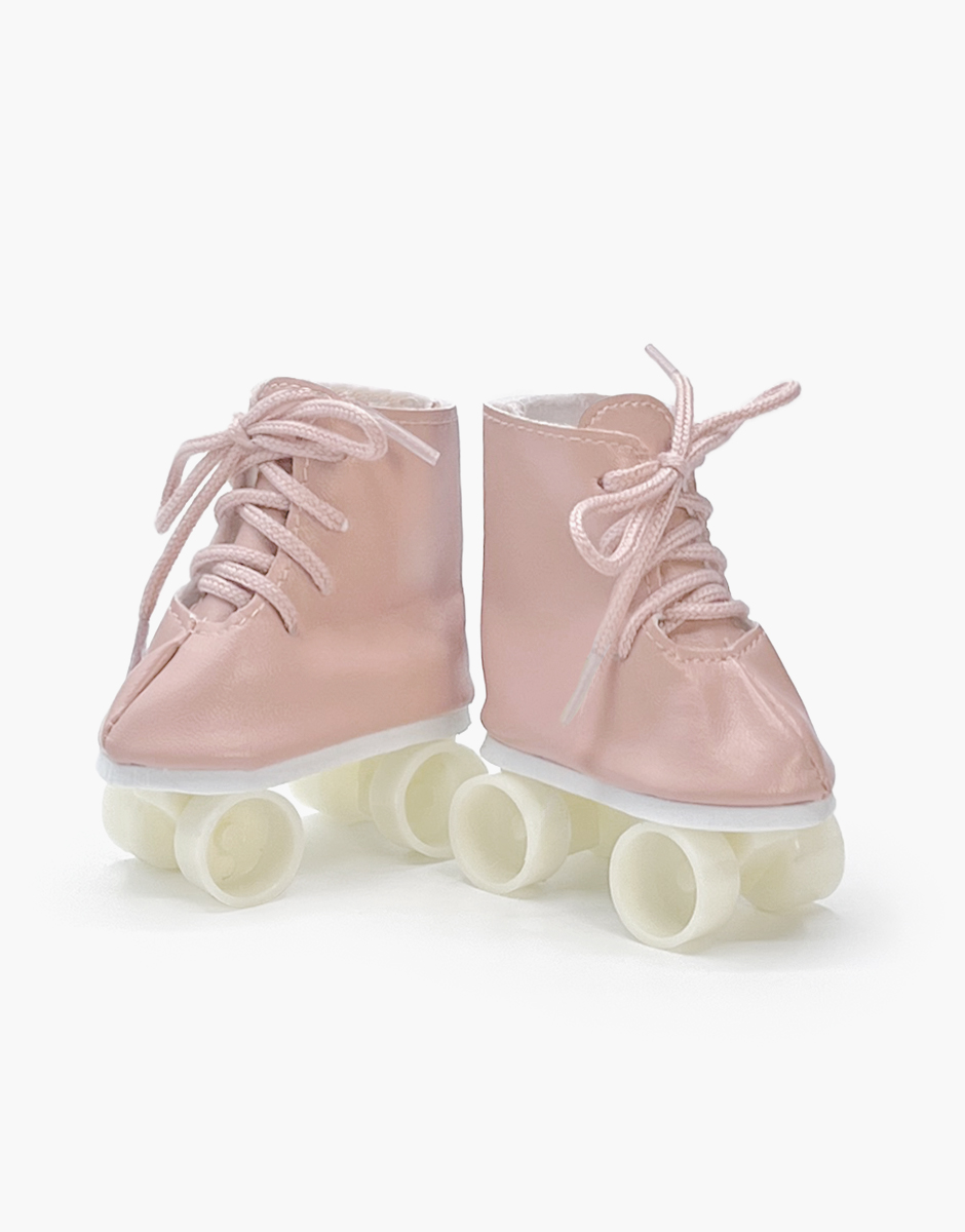 Paire de patins à roulettes en simili cuir rose